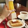 THE BUTTER DISPENSER