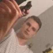 Young Boy With Gun