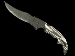 ★ StatTrak™ Falchion Knife | Black Laminate (Battle-Scarred)